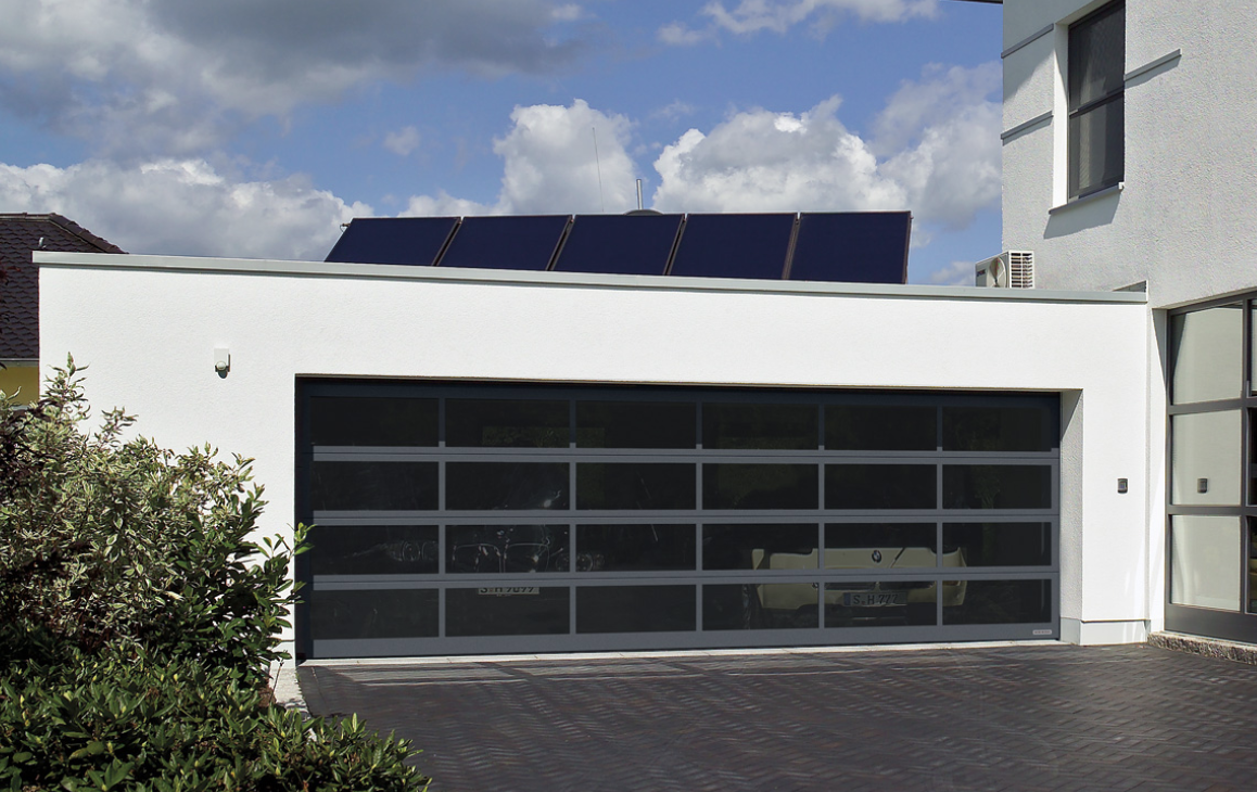 photo de détail en coupe de la porte repliable d'angle Technal Ambial